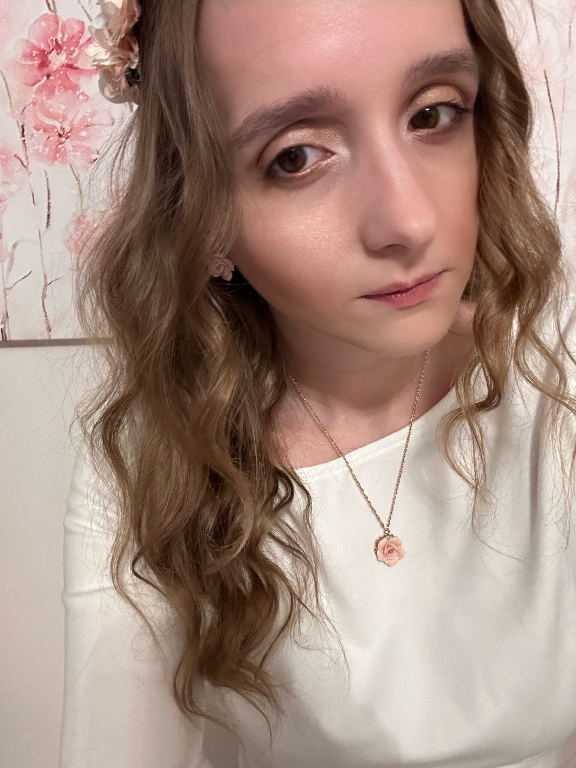 Katherine Moon, the owner of Stridefully, wearing a white dress.